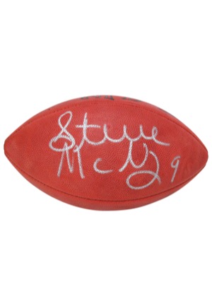 Steve McNair Autographed Football & T-Shirt (2)(JSA)