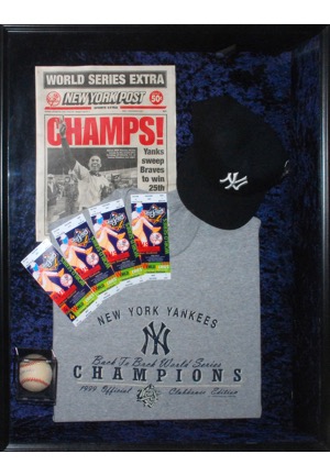 Framed 1999 New York Yankees World Series Champions Shadowbox Display with Joe Torre Autographed Baseball, Newspaper, Tickets, Cap & Shirt (JSA)