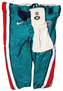 1998 Miami Dolphins Game-Used Road Pants, QB Towel, Cleats & Socks Attributed to Dan Marino