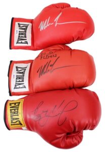 Floyd Mayweather Jr. & Two Mike Tyson Autographed Single Boxing Gloves