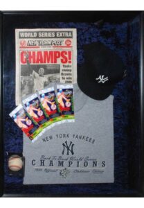 Framed 1999 New York Yankees World Series Champions Shadowbox Display with Joe Torre Autographed Baseball, Newspaper, Tickets, Cap & Shirt