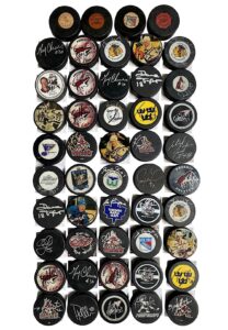 Large Dealer Lot Of Signed Hockey Pucks