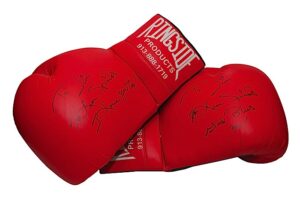 Pair of Leon Spinks Autographed Oversized Boxing Gloves